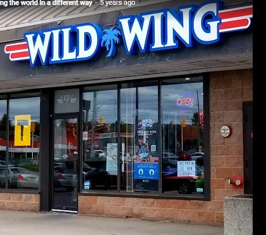 The Wild Wing storefront on North Front St, Belleville, with its old blue sign